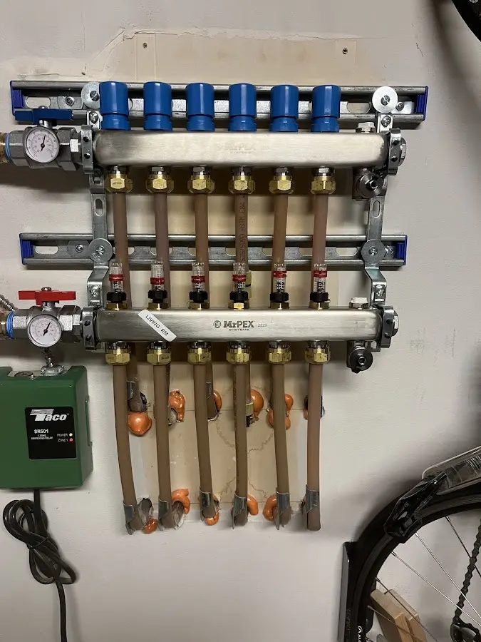 Plumber performing Gas Line Installation at a residential property in Hillandale